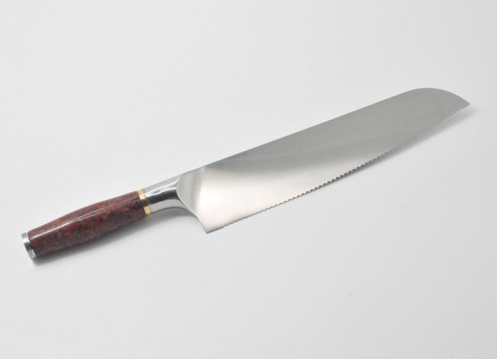10 Inch Bread Knife with a Red Granite Handle, a Garnet Colored Cubic Zirconia Stone at the Back of the Knife and Brass and Stainless Steel Decorative Rings-2
