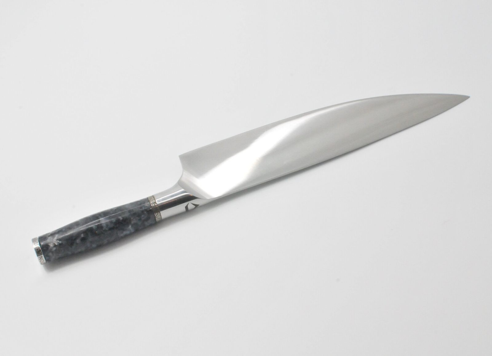 10 Inch Chef Knife with a Moonlight Grey Granite Handle, Aqua Blue Cubic Zirconia at the Back of the Knife and a Stainless Steel Engraved Aztec Decorative Ring