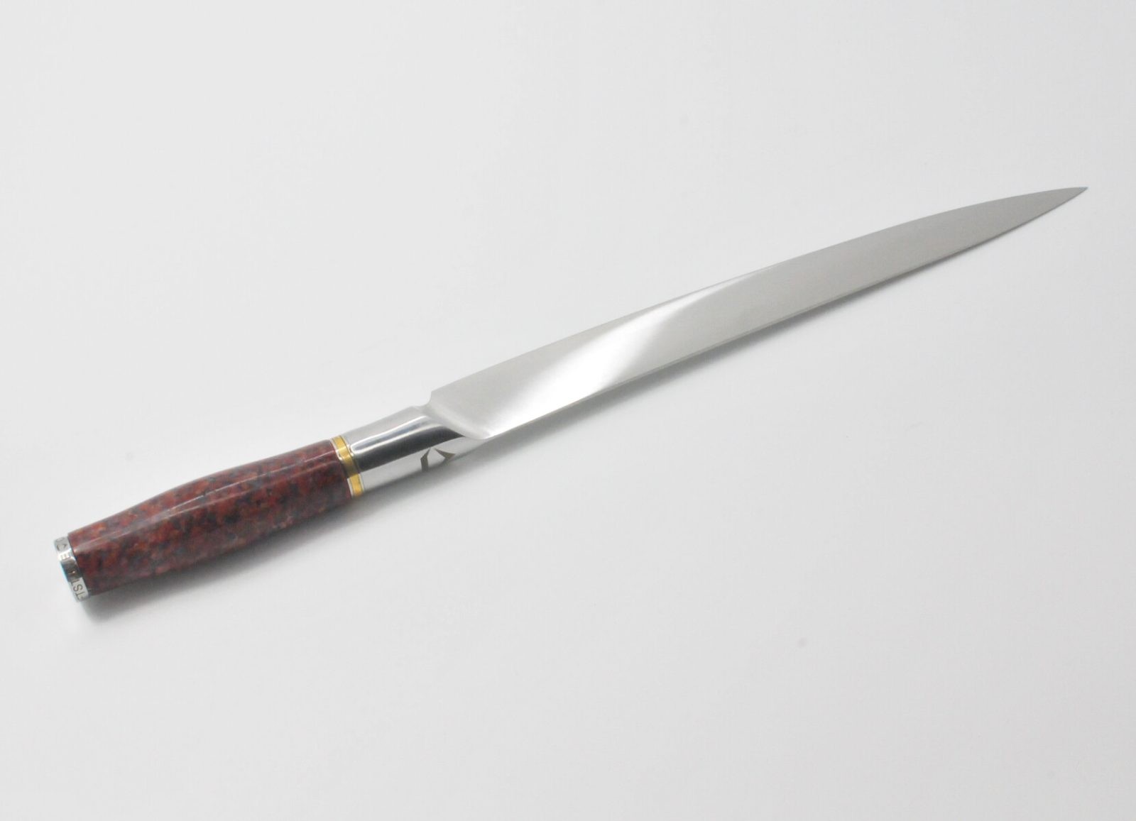 10 Inch Sushi Knife with a Red Granite Handle, a Garnet Colored Cubic Zirconia Stone at the Back of the Knife and Brass and Stainless Steel Decorative Rings