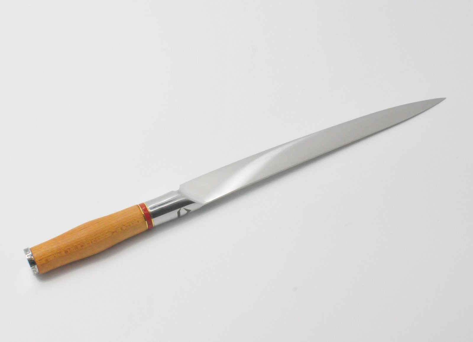 10 Inch Sushi Knife with a Torrefied Maple Handle, a Garnet Colored Cubic Zirconia Stone at the Back of the Knife and Brass and Red Jasper Decorative Rings