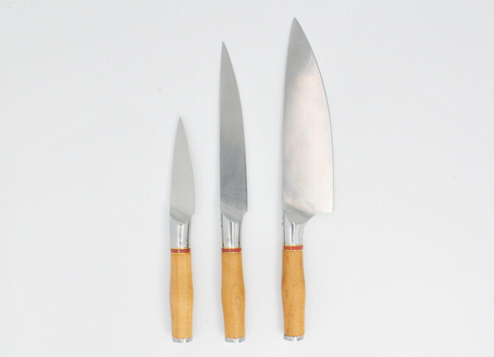 3 Knife Set with a Torified Maple Handle, a Garnet Colored Cubic Zirconia Stone at the Back of the Knife and Brass and Red Jasper Decorative Rings