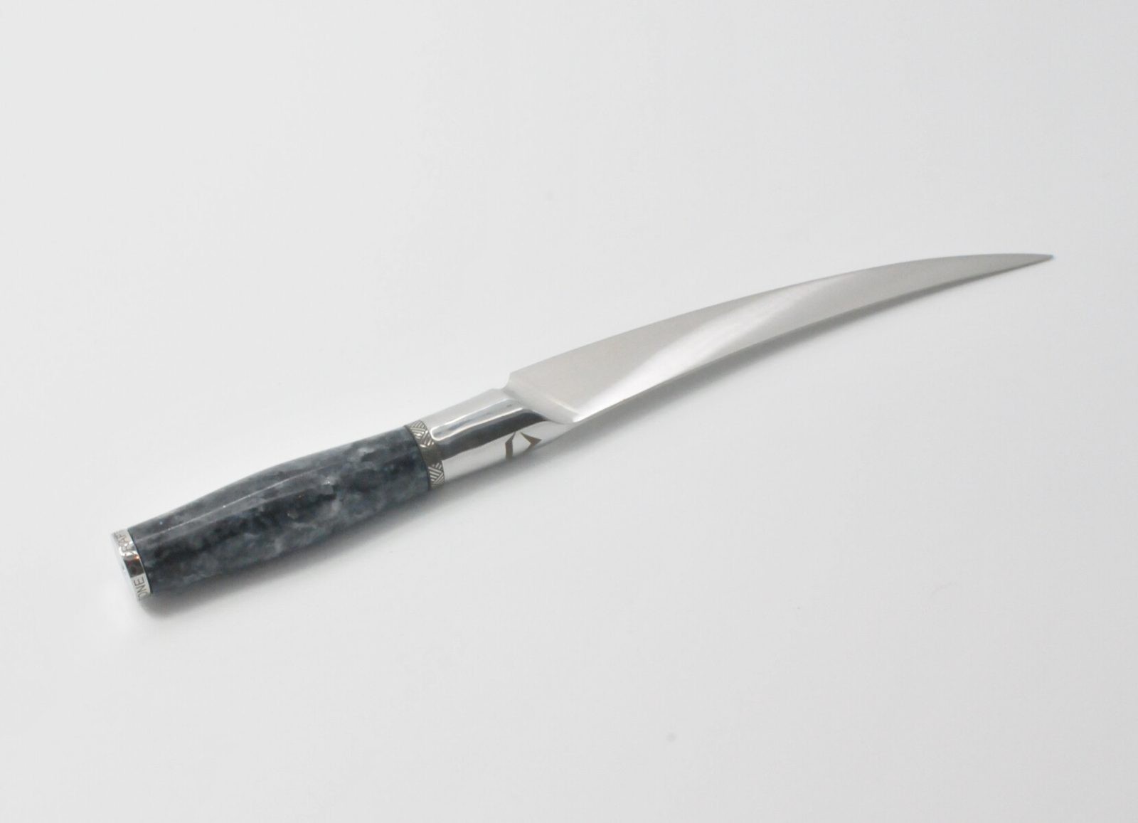 7 Inch Filet Knife with a Moonlight Grey Granite Handle, Aqua Blue Cubic Zirconia at the Back of the Knife and a Stainless Steel Engraved Aztec Decorative Ring