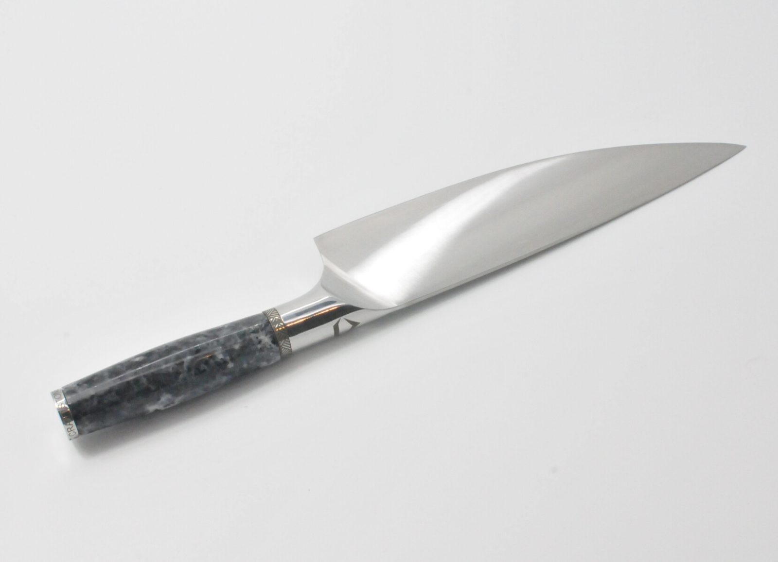 8 Inch Chef Knife with a Moonlight Grey Granite Handle, Aqua Blue Cubic Zirconia at the Back of the Knife and a Stainless Steel Engraved Aztec Decorative Ring