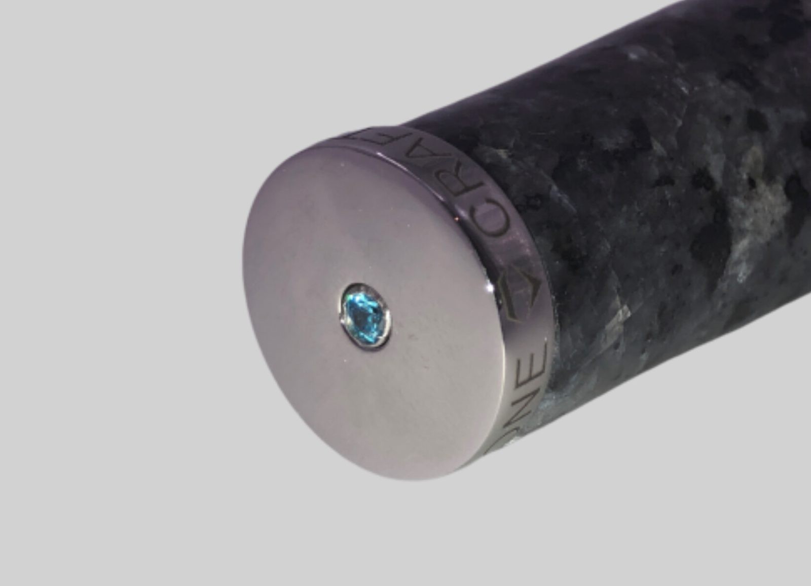 Moonlight Grey Granite Handle with a Aqua Blue Cubic Zirconia at the Back of the Knife