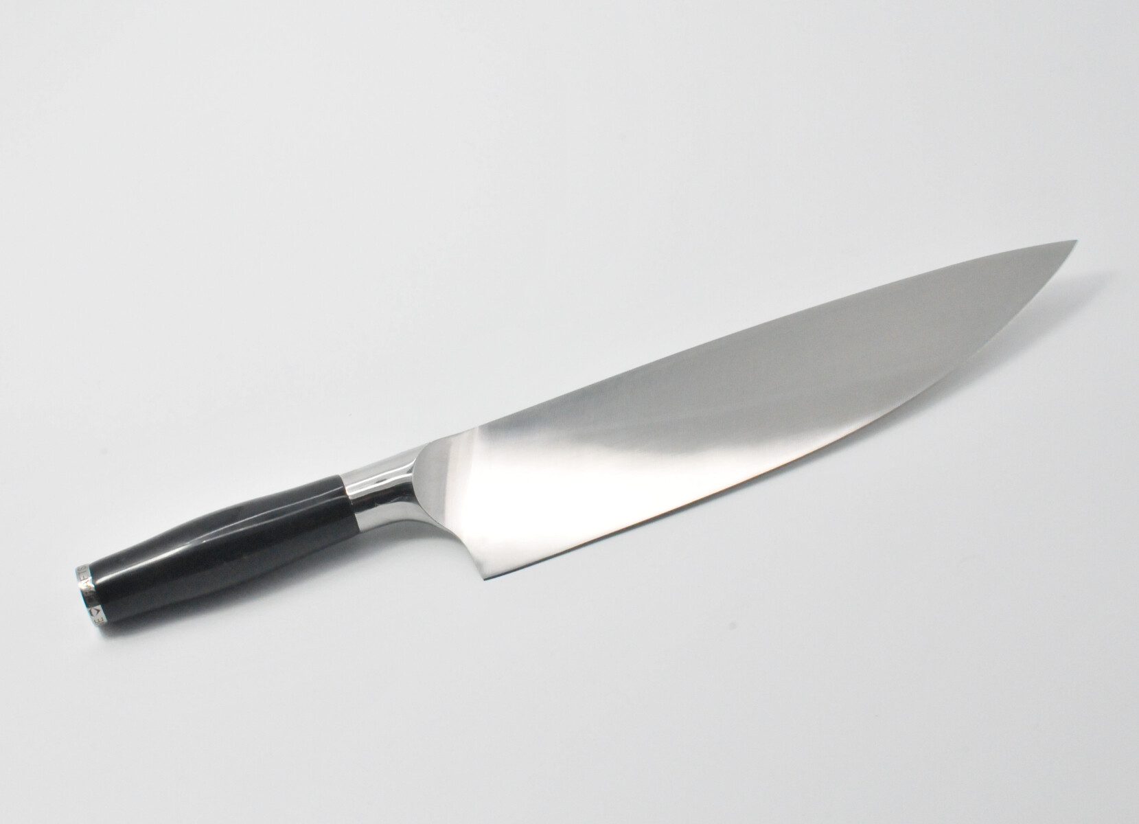 https://www.craftstoneknives.com/wp-content/uploads/bfi_thumb/10-Inch-Chef-Knife-with-a-Black-Marble-Handle-and-a-Black-Cubic-Zirconia-Stone-at-the-Back-of-the-Knife.-3jbcckd9tdfg92485oktu2.jpg
