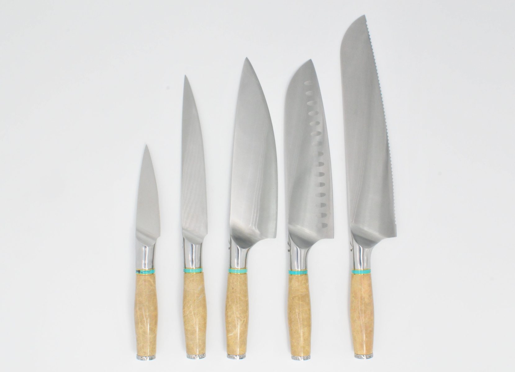 https://www.craftstoneknives.com/wp-content/uploads/bfi_thumb/5-Knife-set-with-a-Light-Emprador-Marble-Handle-Swiss-Blue-Cubic-Zirconia-Stone-at-the-Back-of-the-Knife-and-Turquoise-and-Brass-Decorative-Rings-39d9bq3hm9bh9ob7gicgei.jpg
